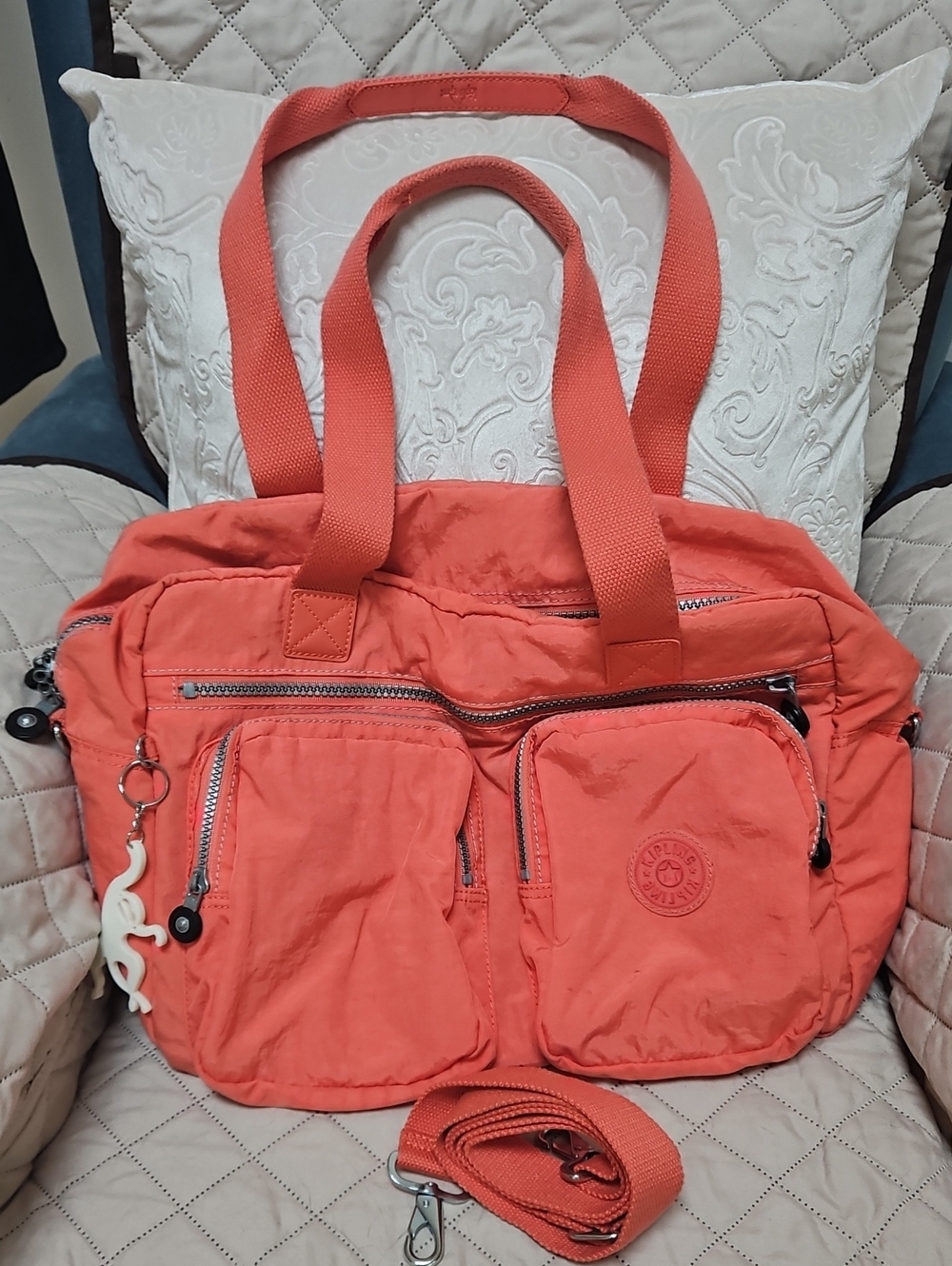 Kipling Coral Nylon Duffle with Multiple Front Pockets and Detachable Strap